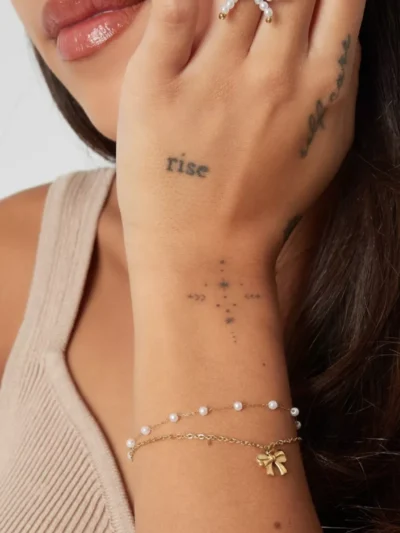 Yehwang Yehwang Armband met strik en parels | Goud