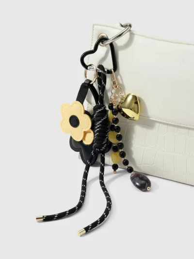 Manoon Manoon Bloemen tas hanger | Zwart