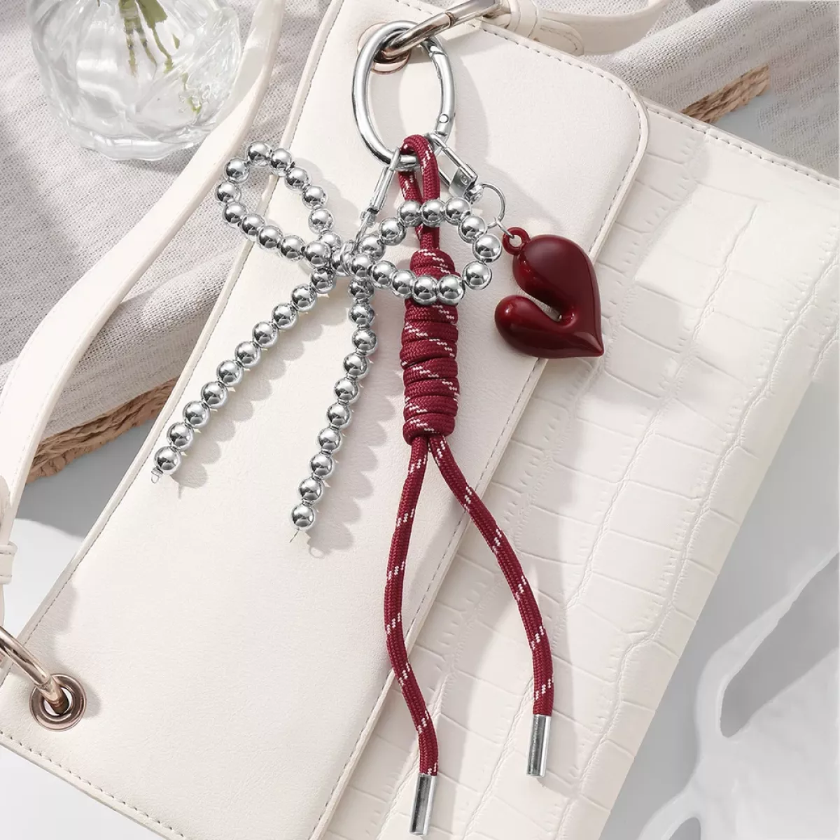 Manoon Hart strik knoop tas bedel | Rood 2 Manoon Manoon Hart strik knoop tas bedel | Rood