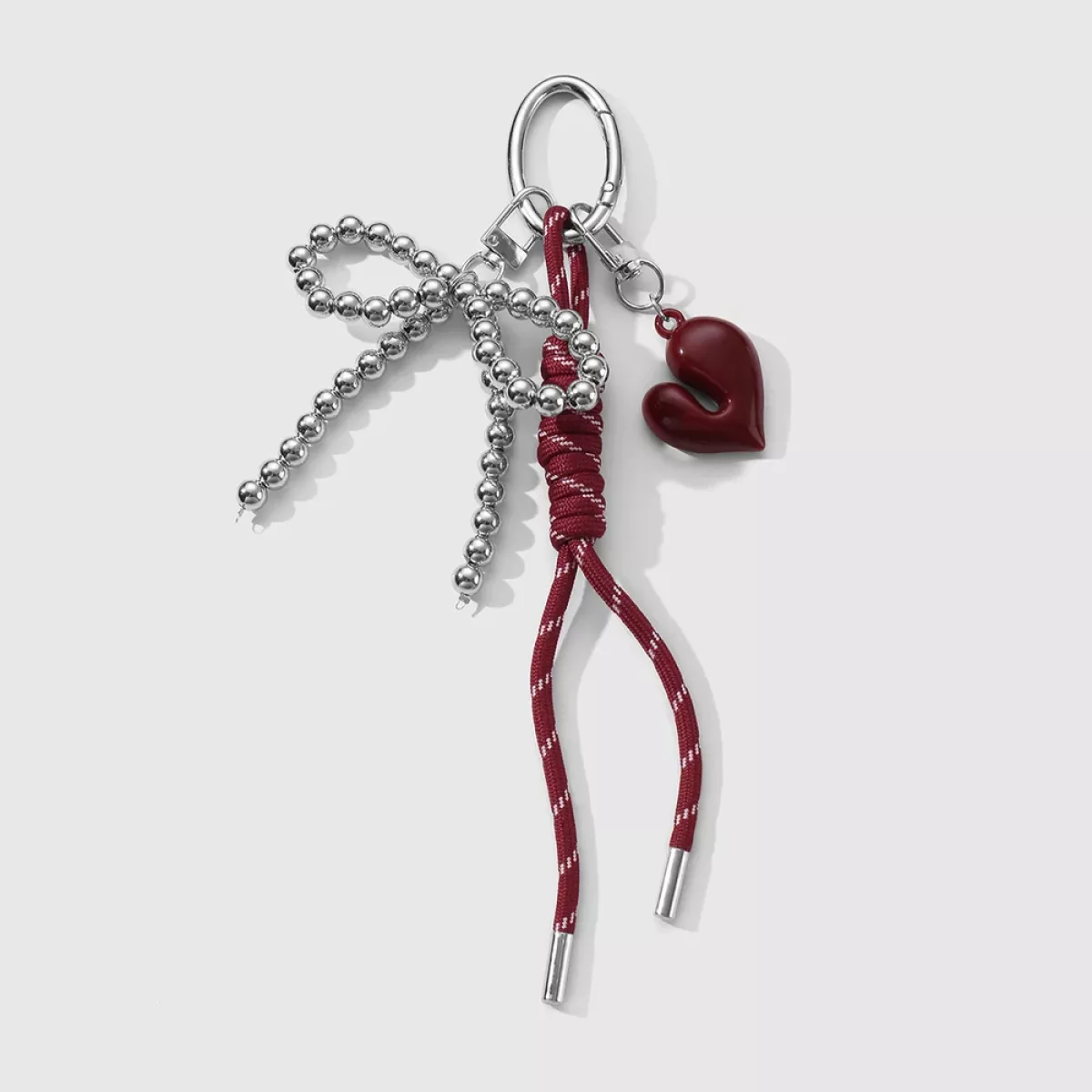 Manoon Hart strik knoop tas bedel | Rood 1 Manoon Manoon Hart strik knoop tas bedel | Rood