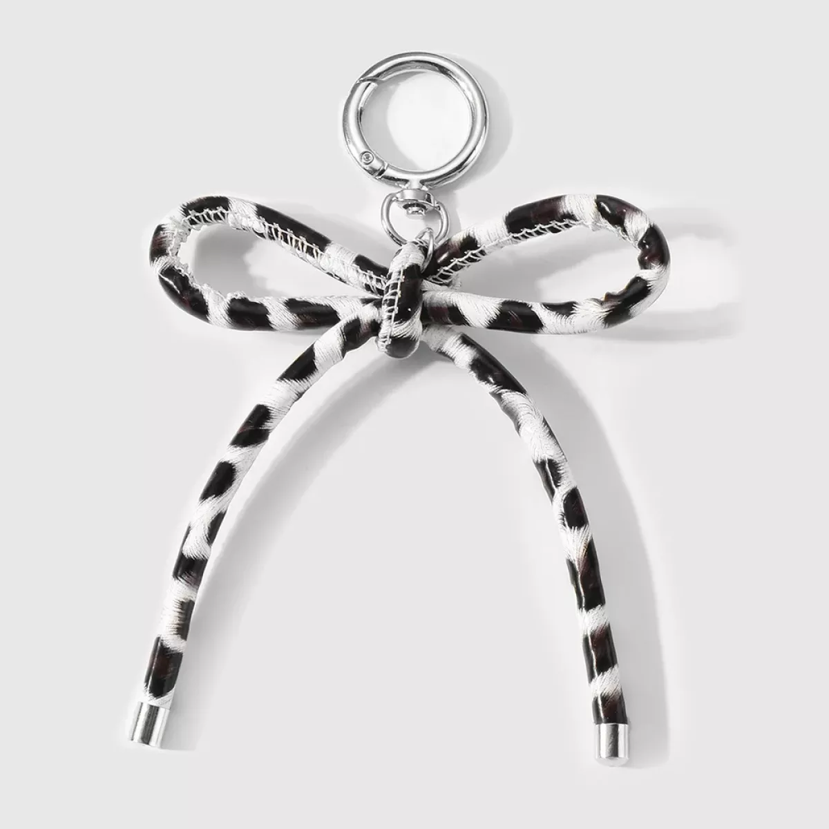 Manoon Strikknoop koe tasbedel | Wit 1 Manoon Manoon Strikknoop koe tasbedel | Wit