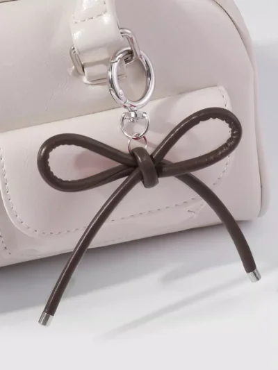 Manoon Manoon Strikknoop tasbedel | Bruin