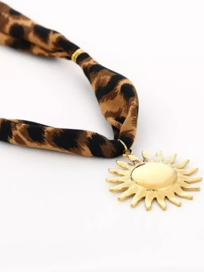 Michelle Michelle ketting stof met hanger zon | Goud