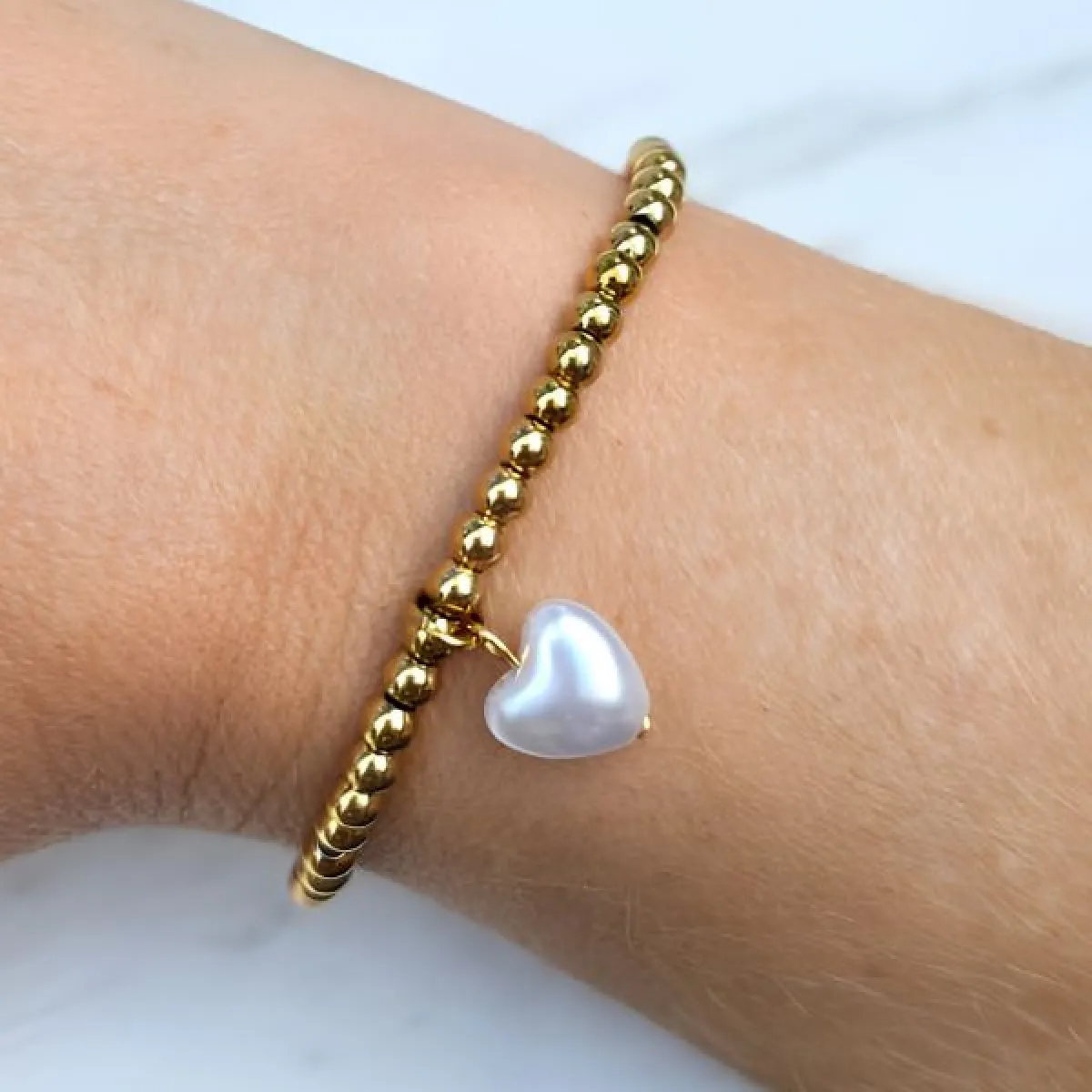 LabelSix Kralenarmband bedel heart | Goud 2 LabelSix LabelSix Kralenarmband bedel heart | Goud