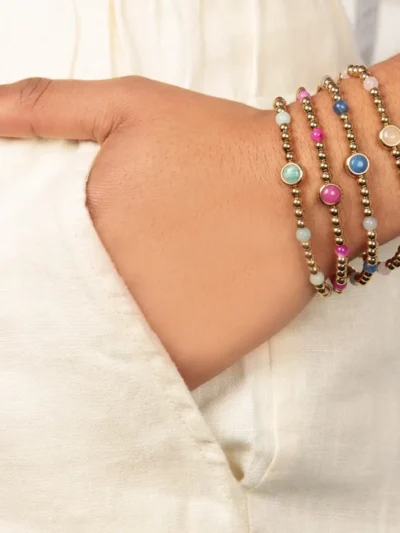 My Bendel My Bendel Bedelarmband met Rose Quartz | Goud